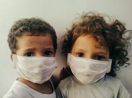 Kids wearing surgical masks